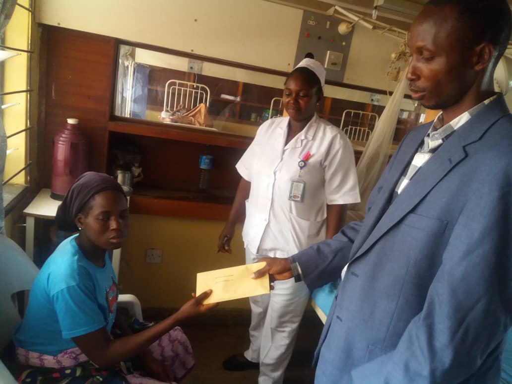 woman, nurse and a business man talking